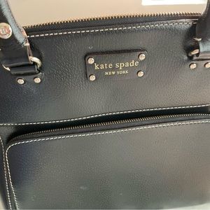 Kate Spade Satchel Black leather. Outside zipper. Top zipper.